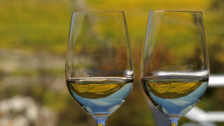Wachau white wine in glasses, © Petr Blaha Two wine glasses with white wine in front of a blurred background.