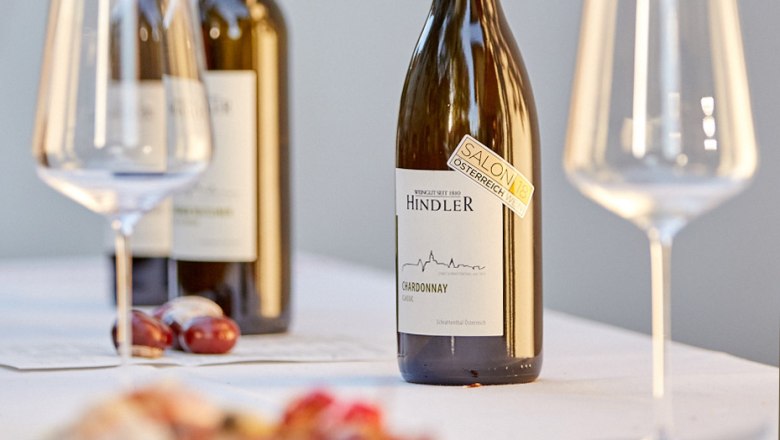 Wine tasting, © Weingut Hindler Wine bottles and glasses on a table, Hindler winery.