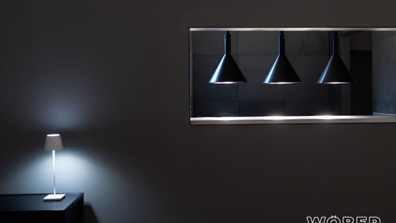 TDR-Restaurant WÖBER inside, © Restaurant Wöber Lamps in front of a black wall