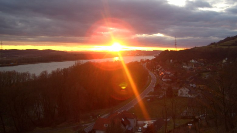 Sunset1, © Gasthof Donaublick Sunset over a landscape with river and road.