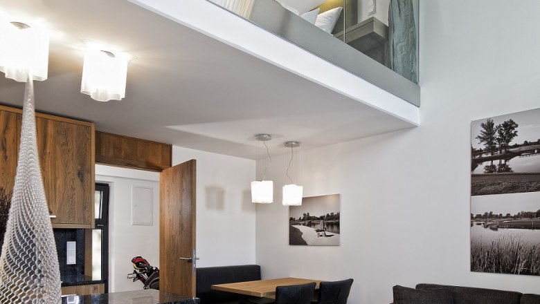 Apartment, © DCC Modern apartment with gallery, wooden furniture and stylish lighting.