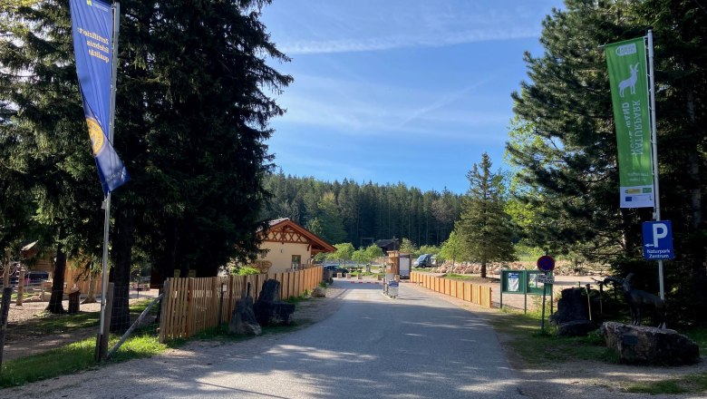 Nature Park Center Entrance, © Naturpark Hohe Wand Entrance to the nature park center with flags and trees.