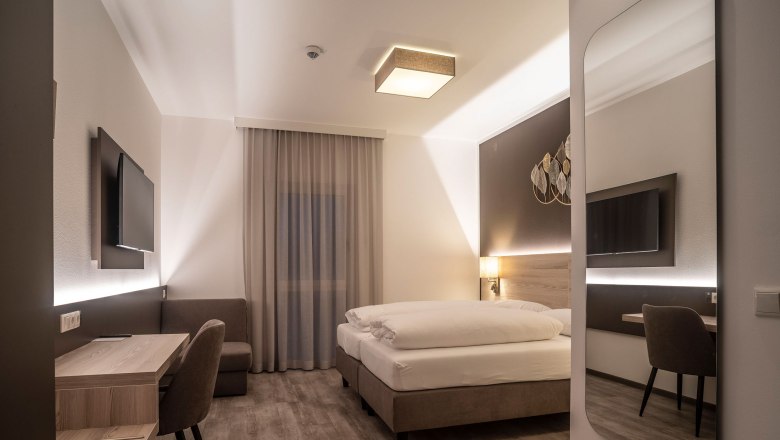 Bedroom, © BAWU HotelbetriebsgmbH, Fotograf Petr Dobias Bedroom, © BAWU HotelbetriebsgmbH, Fotograf Petr Dobias