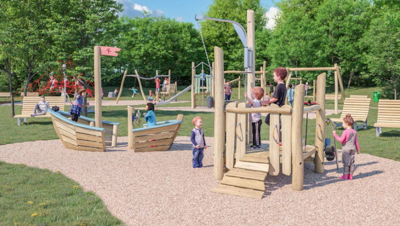 Spacious playground, © Fa. Kompan Children play on the large playground with wooden equipment and slides