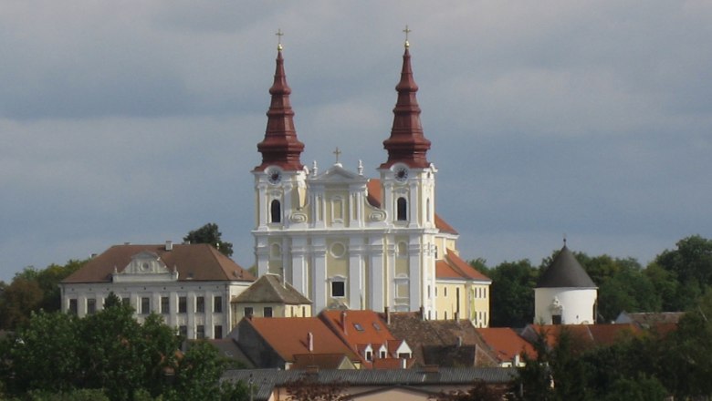 Church, © Dr. Josef Glasl Baroque church with two towers and surrounding buildings.