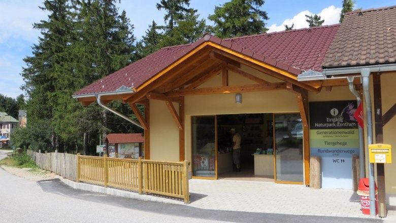 nature park center, © Naturpark Hohe Wand Entrance to a nature park center with wooden veranda and information sign.