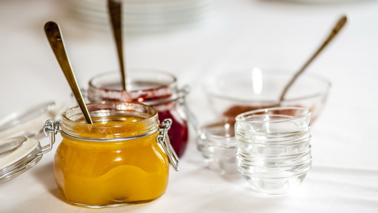 Breakfast, © Imre Antal Close-up of jam jars on a table.