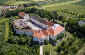 Mailberg Castle, © Schlosshotel Mailberg / Malteser Ritterorden Aerial view of Mailberg Castle with surrounding landscape.