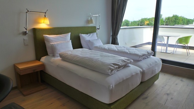 Diamond Country Club Apartment, © DCC Modern bedroom with double bed and balcony.