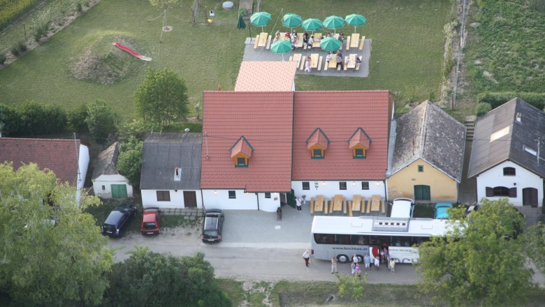Winery & Buschenschank (typical tavern) Greilinger, © Greilinger Aerial view of a winery with terrace and bus.