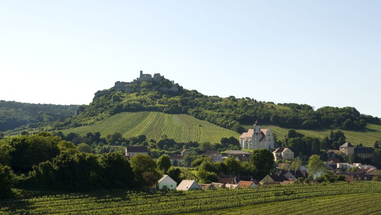 Falkenstein castle ruins, © Michael Himml Landscape with castle on a hill, vineyards and village in the foreground.