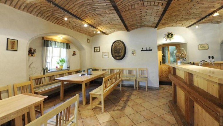 Wine tavern, © Steve Haider Interior view of a traditional wine tavern with wooden furniture and brick vaults.