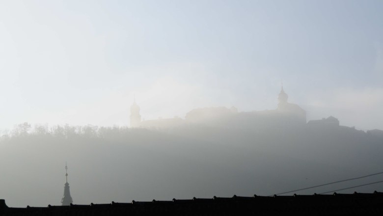 View of Göttweig in the fall, © Franz Böck Fog-shrouded silhouette of Göttweig in the fall.