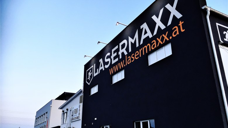 Lasermaxx back, © Suracon OG Building with large Lasermaxx logo and website address on the façade.