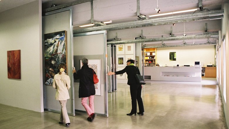 Artothek interior view, © Artothek Interior view of an art library with people looking at works of art.