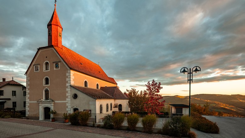 Pilgrimage church St. Corona am Wechsel, © Wiener Alpen, Kremsl Pilgrimage church of St. Corona am Wechsel at sunset with a dramatic sky.