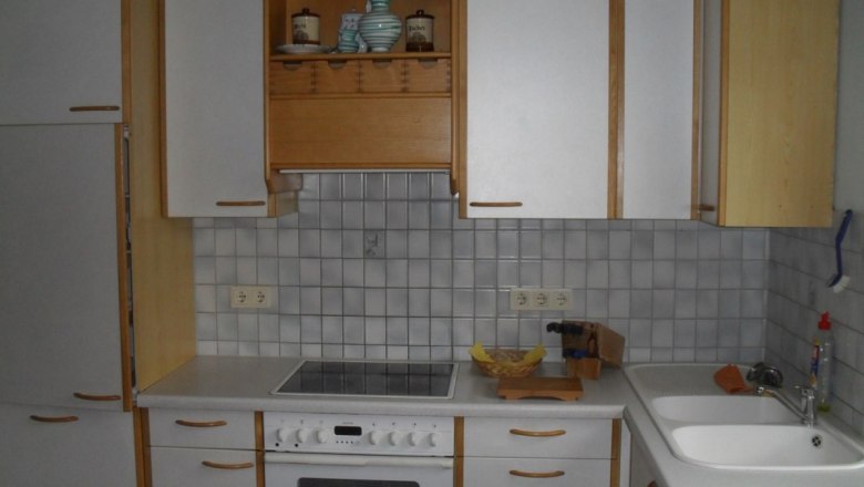 Kitchen in the Horak vacation apartment, © Hubert Horak Kitchenette with stove, sink and cupboards in a vacation apartment.