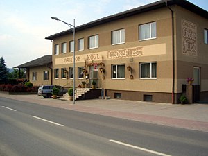 House view, © Gasthof Kögl Two-storey building with the inscription 'Gasthof Kögl'.