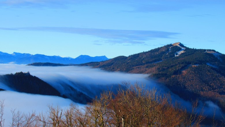 View from the Enzianhütte, © Stefanie Rysavi View from a mountain of mist-covered valleys and wooded hills.