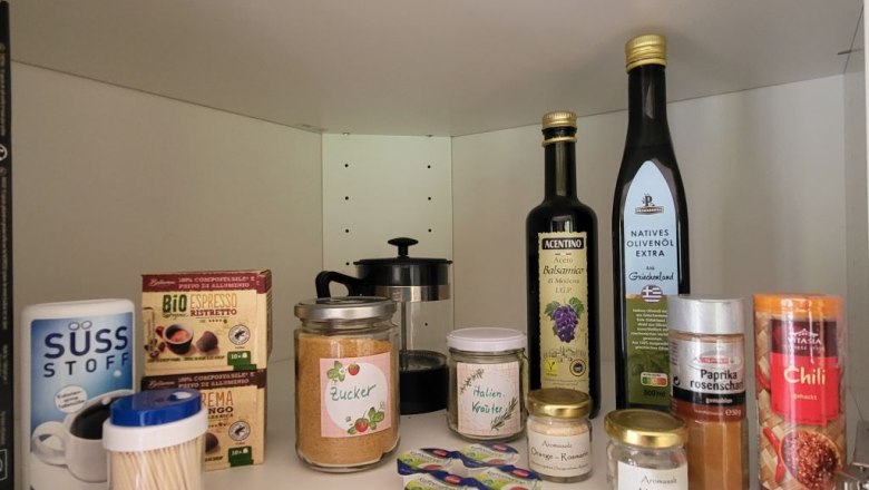 Basic food equipment, © Villa to go Storage cupboard with spices, oils and coffee.
