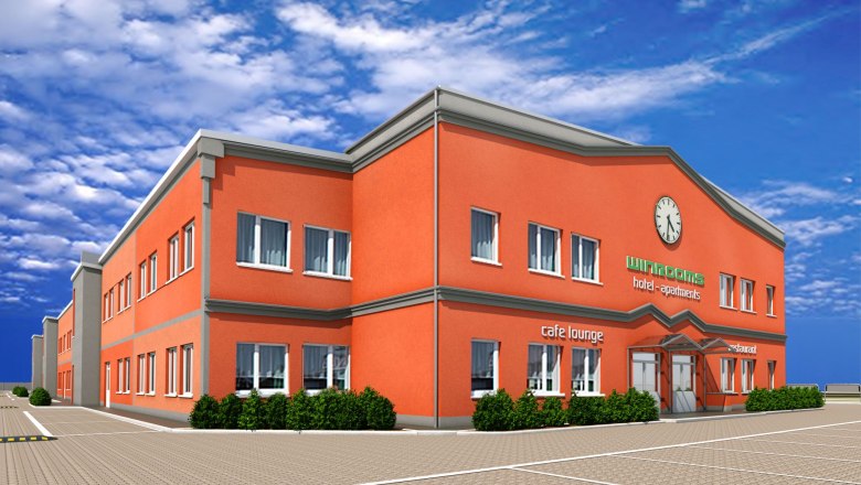 Hotel Winrooms in Wiener Neustadt, © Winrooms Betrieb GmbH Exterior view of the Hotel Winrooms in Wiener Neustadt with orange facade and clock.