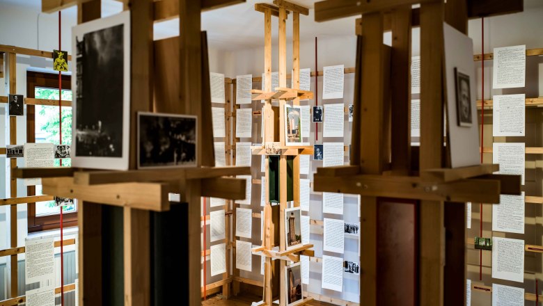 Peace Museum Erlauf Interior view, © Robert Herbst Interior view of the Erlauf Peace Museum with wooden installation and documents on display.