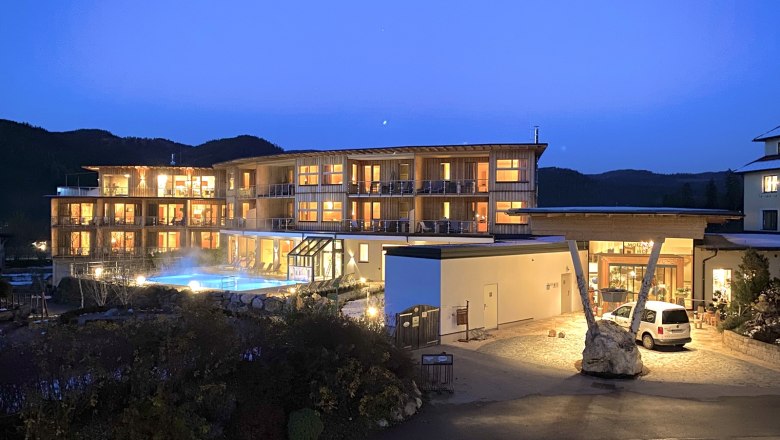 Molzbachhof by night, © Peter Pichler Hotel Molzbachhof at night with illuminated windows and pool.