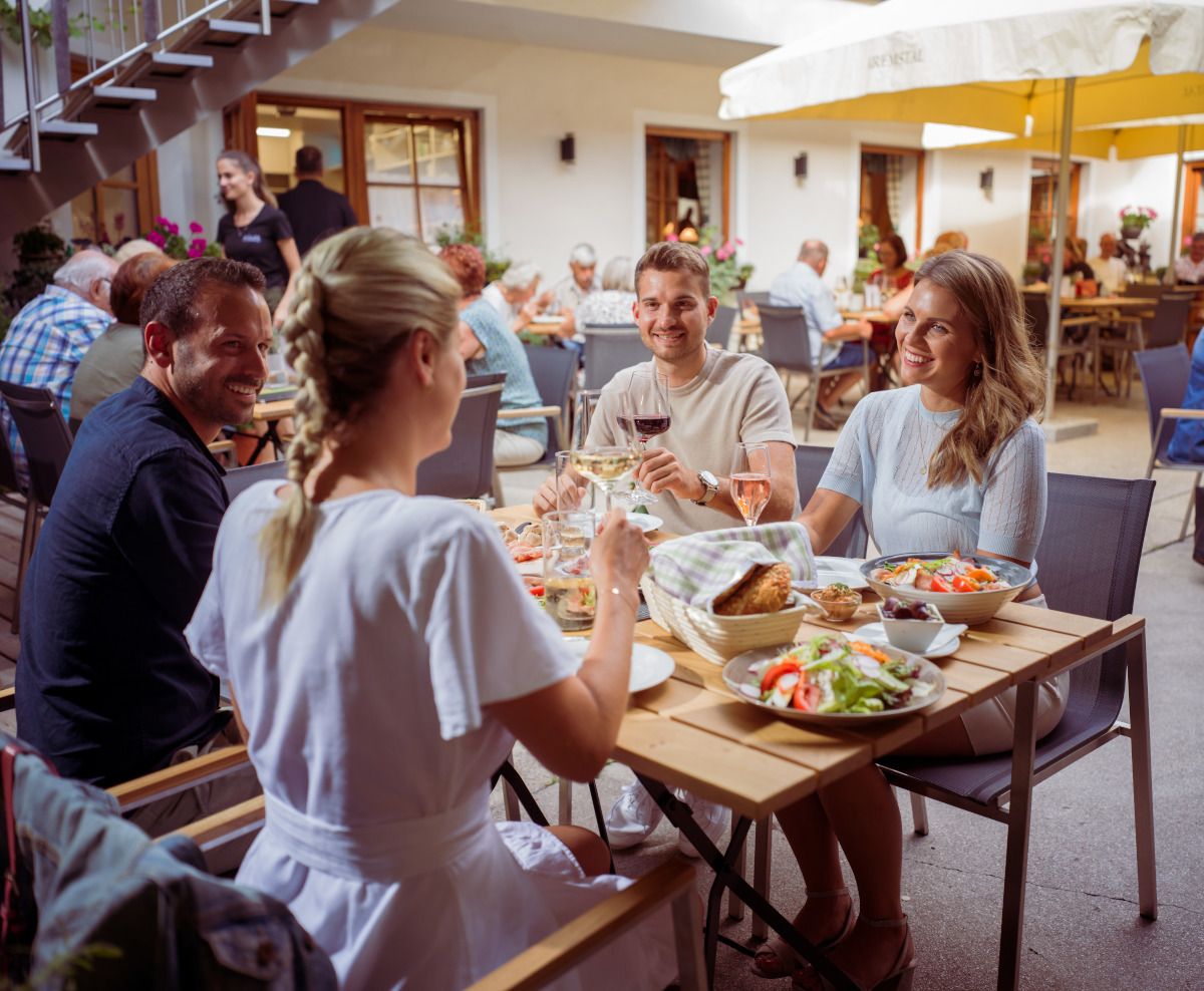 Four guests at the wine tavern
