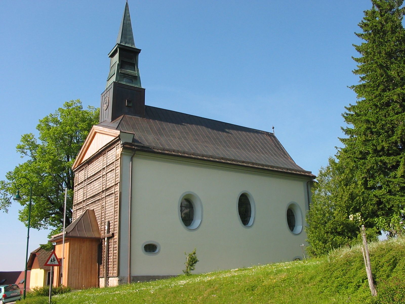 St. Anne's Church in Puchenstuben with green surroundings and blue sky.