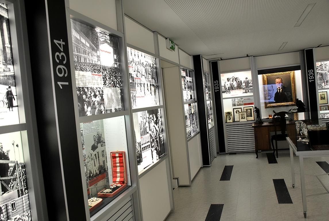 Interior view of a museum with historical photos and exhibits