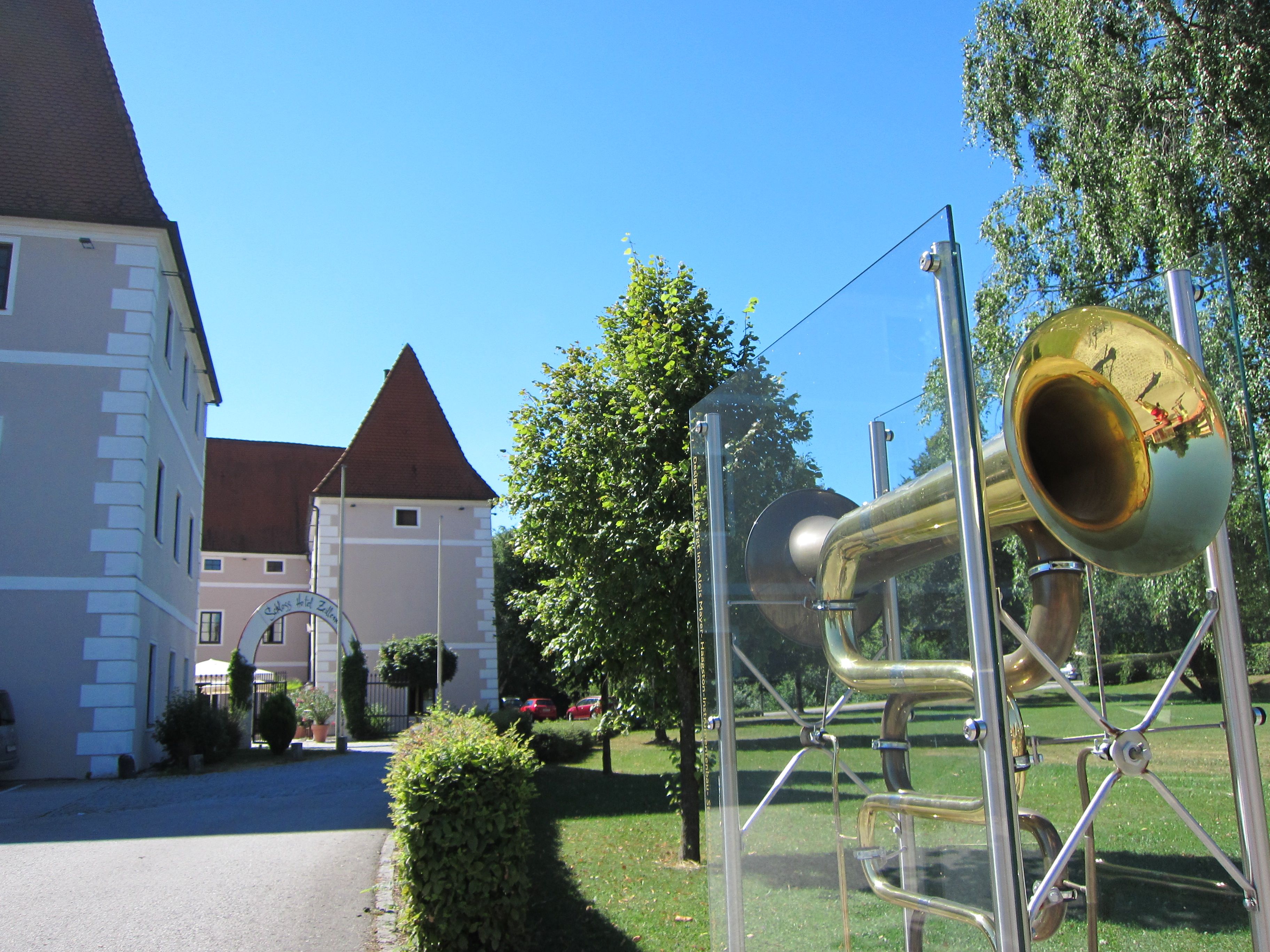 Zeillern Castle with a large trumpet in the foreground.