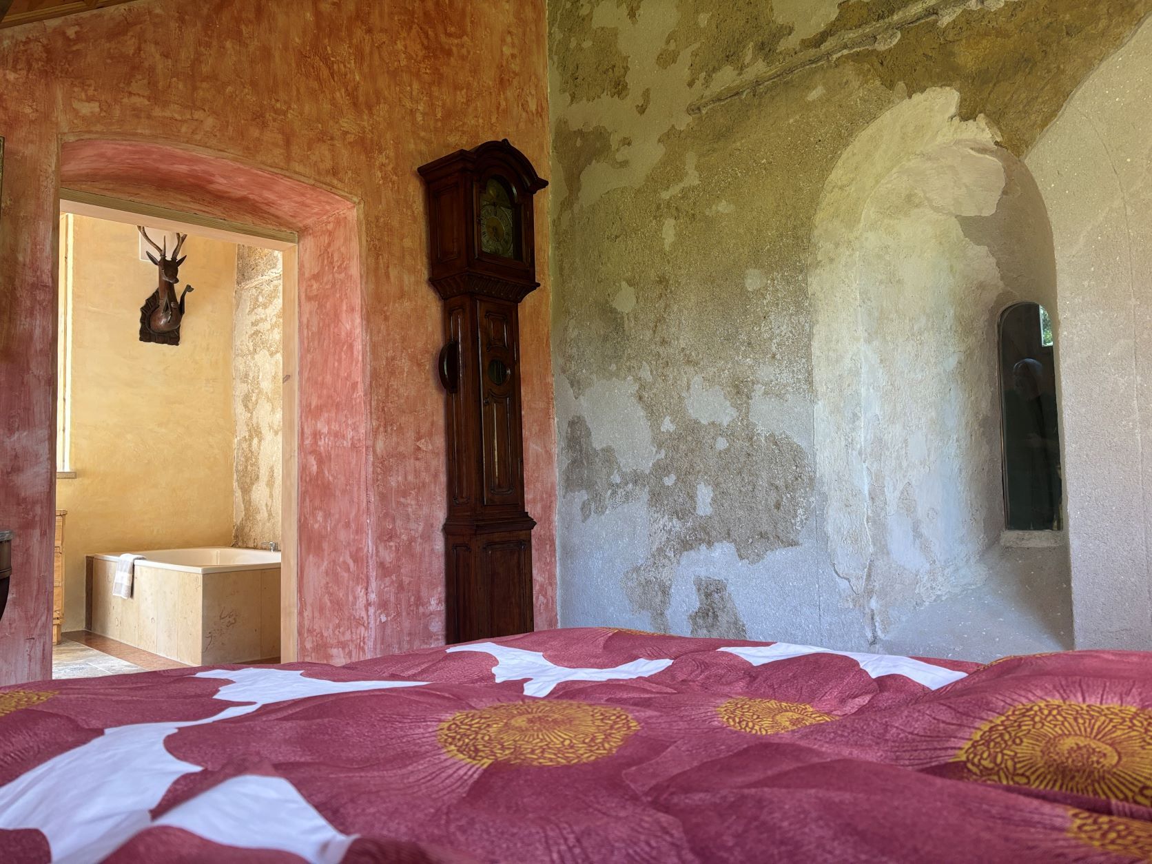 Romanesque window in the bedroom