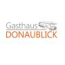 Logo of the Donaublick inn with building drawing.
