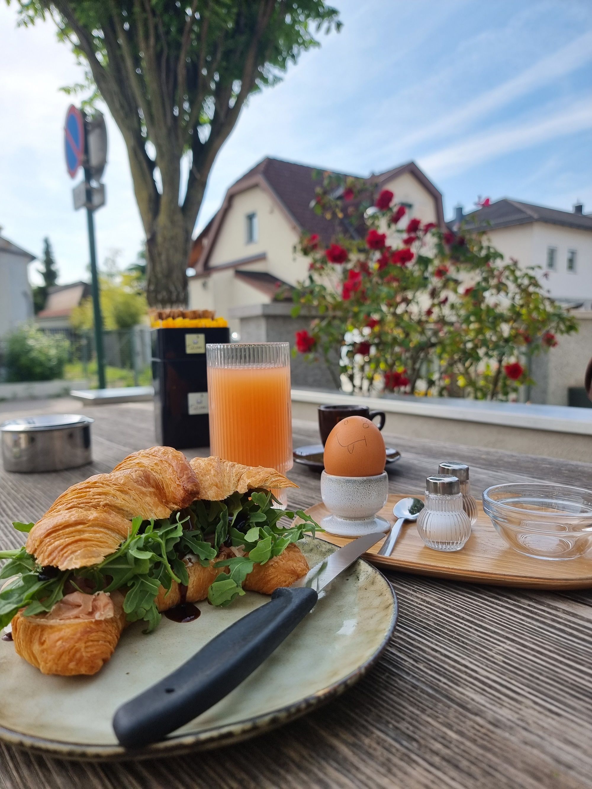 Crescent filled with salad on a table in the outdoor area 