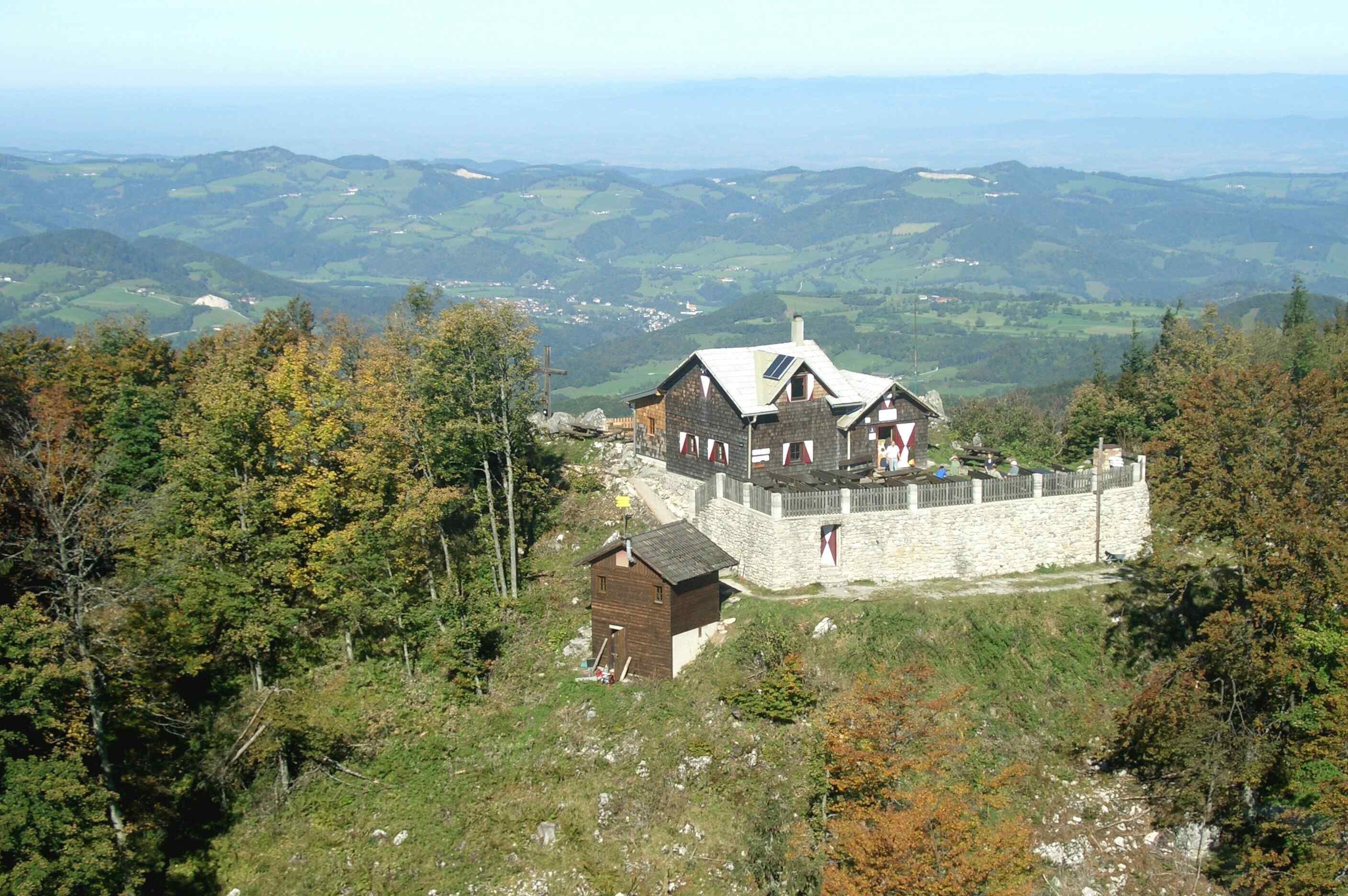 Mountain landscape with the Otto Kandler House in the foreground.