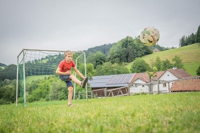 Playing football on a special pitch, © Einkehrhof Poggau