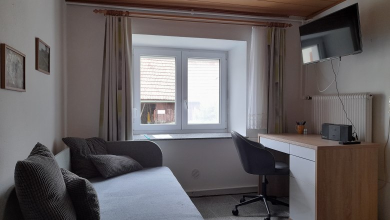 Office corner and Smart TV with SAT in the living room, &copy; Ferienhaus Leopold