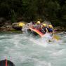 Group of people rafting on a wild river.