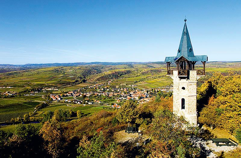 Kamptalwarte on a hill with a view of a wide landscape and a village.