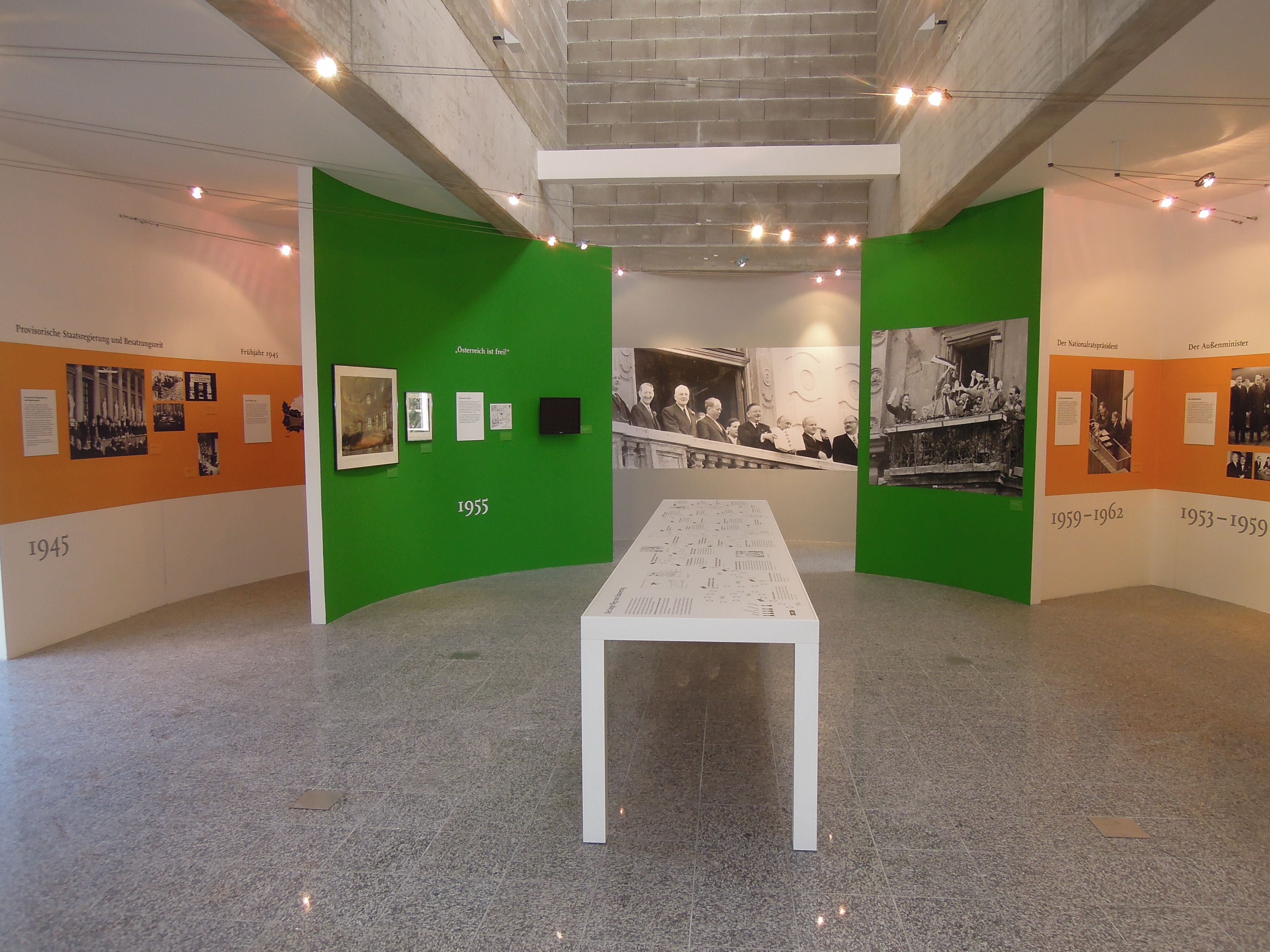 Interior view of the Leopold Figl Museum with historical exhibition walls and photos.