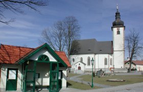 Church and building in Gro&szlig;dietmanns in sunny weather.