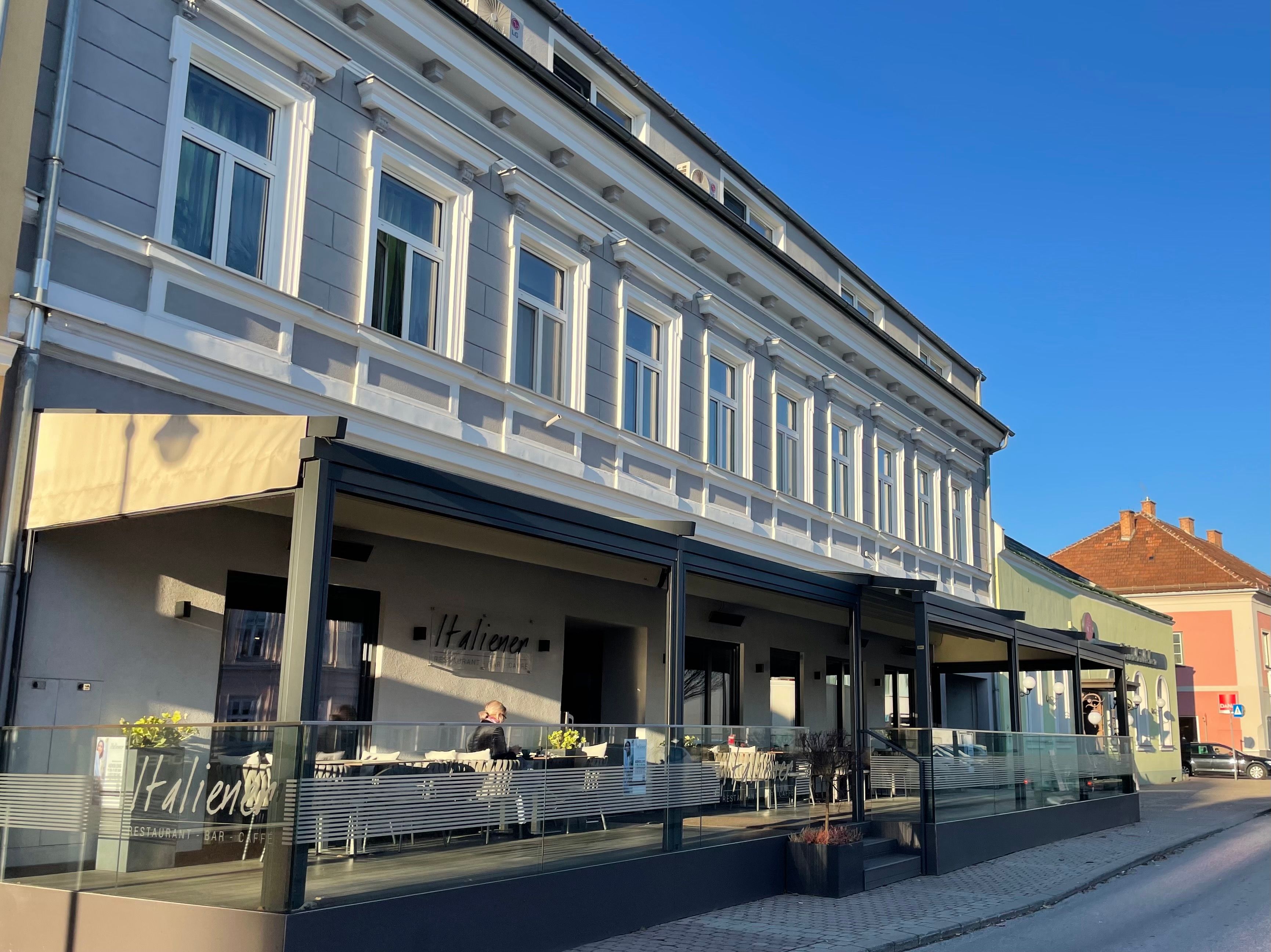 Exterior view of an Italian restaurant with terrace