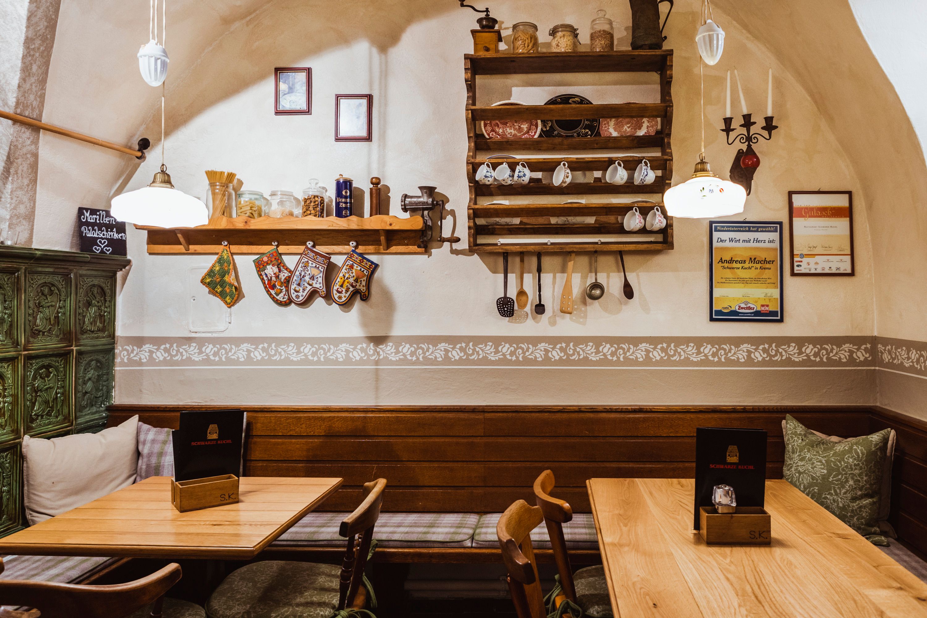 Cozy dining room with wooden furniture and traditional decoration.