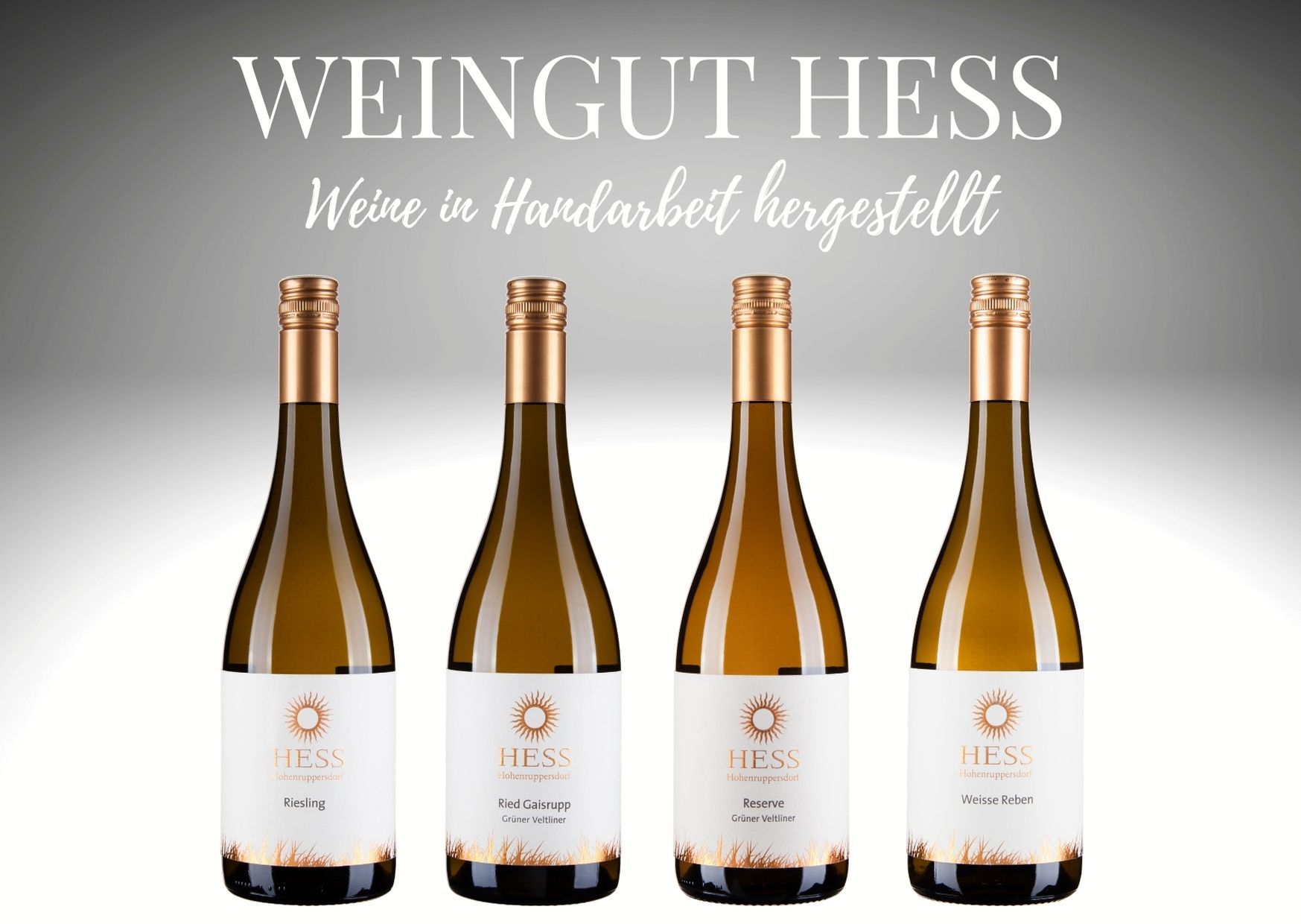 Four bottles of wine from the Hess winery against a gray background.
