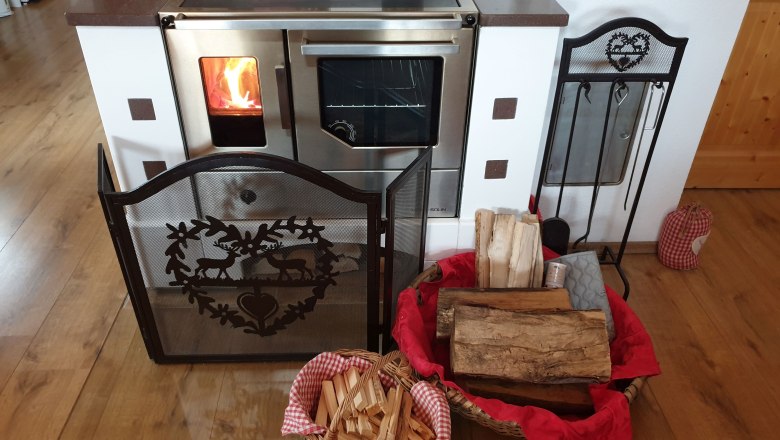 Wood stove living room, © Gebhard Auer