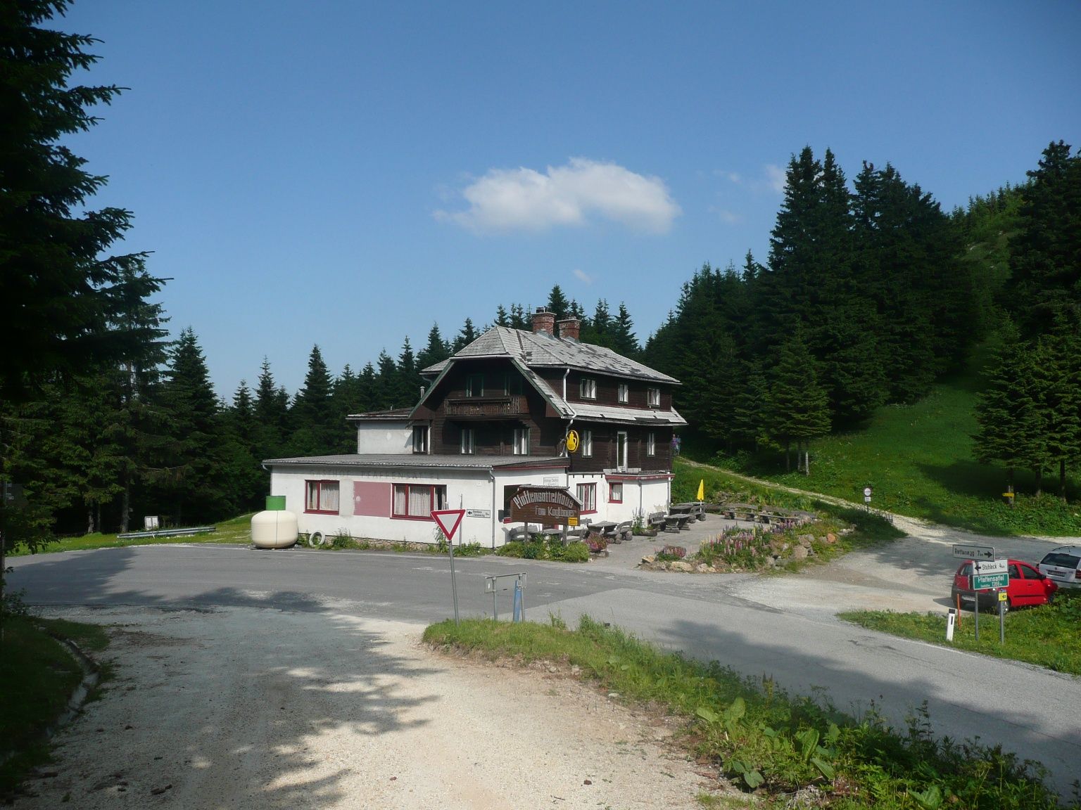Parking lot at the Pfaffensattel to the right of the closed Pfaffensattelhaus