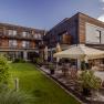 Exterior view of the Donau Lodge Ybbs with terrace and garden.