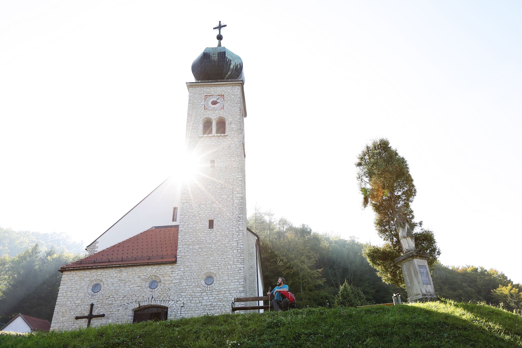 Maria Schnee pilgrimage church with sunshine through the church tower.