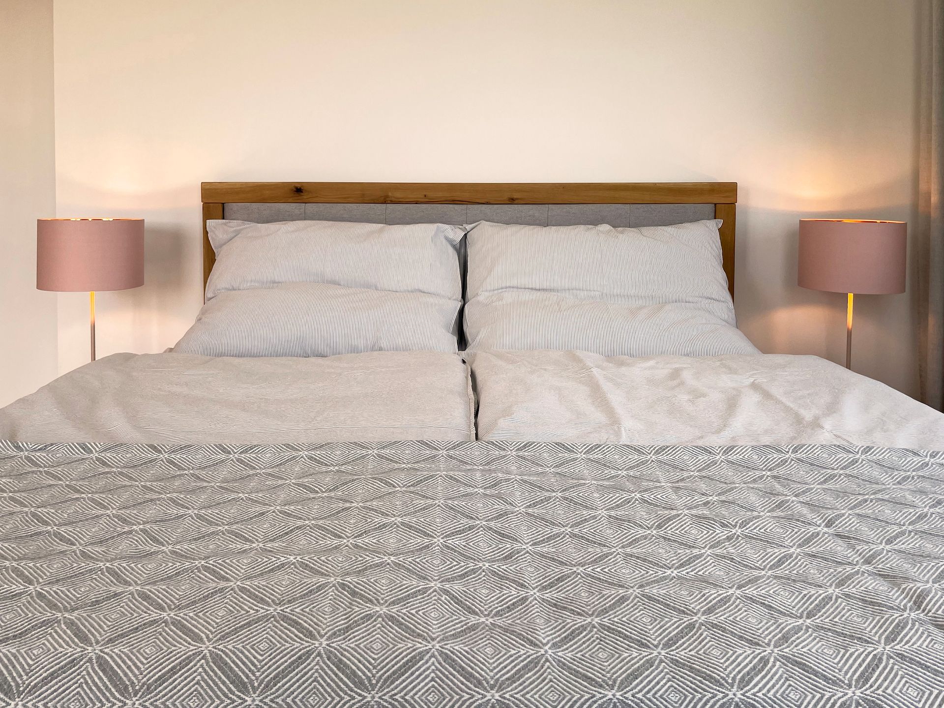 Box-spring bed in bedroom 1