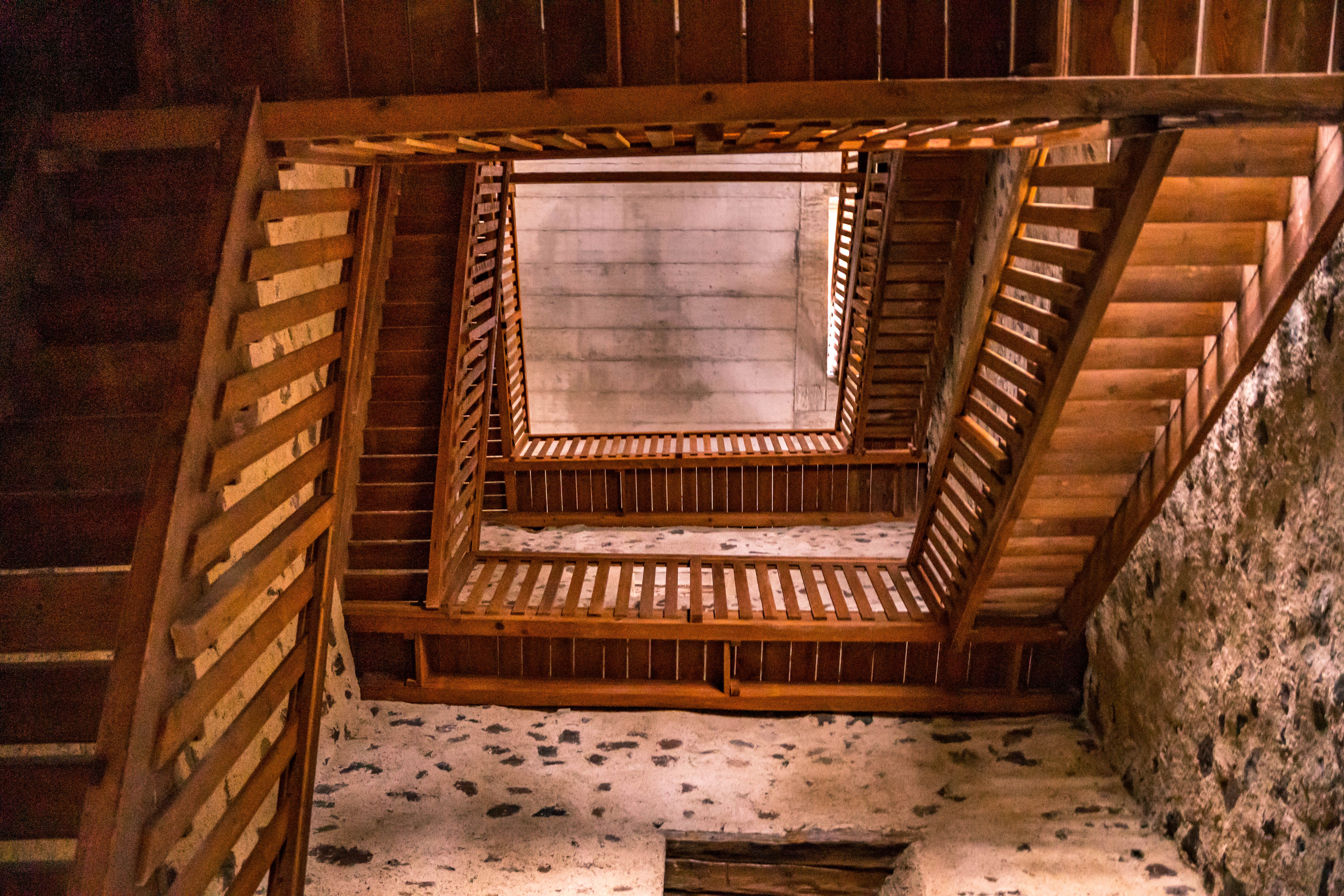View from below of a wooden staircase in the fire tower at the ruins of Kirchschlag Castle.